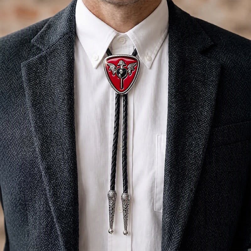 Bolo in smalto rosso con teschio alato in stile gotico western. - image 1