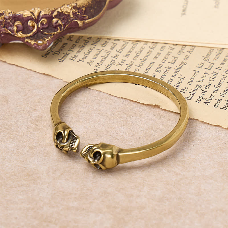 Bracciale rigido aperto in ottone massiccio con doppio teschio in bronzo gotico. - image 4