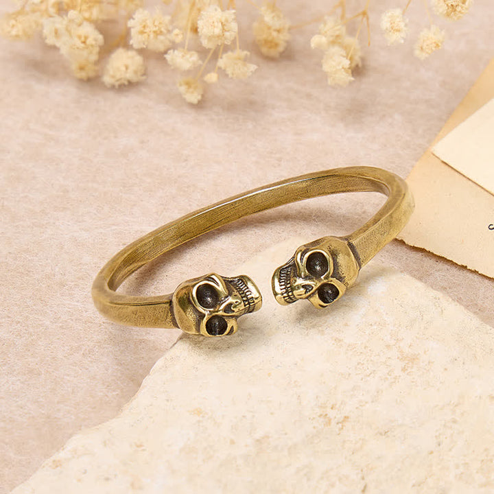 Bracciale rigido aperto in ottone massiccio con doppio teschio in bronzo gotico. - image 3