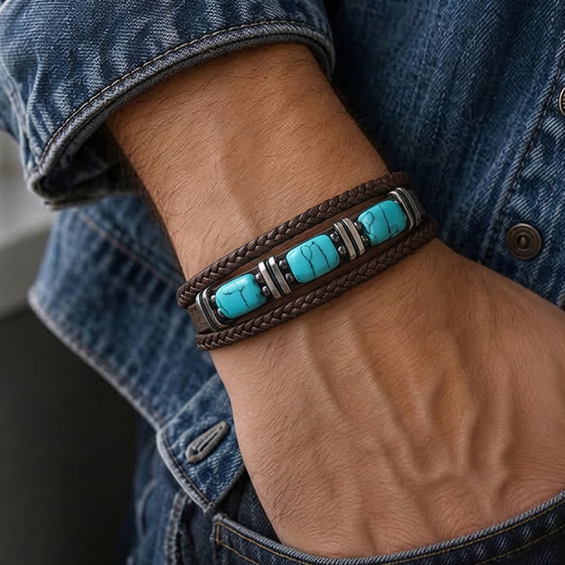 Bracciale da uomo in pelle intrecciata stile western con inserti in turchese. - image 1