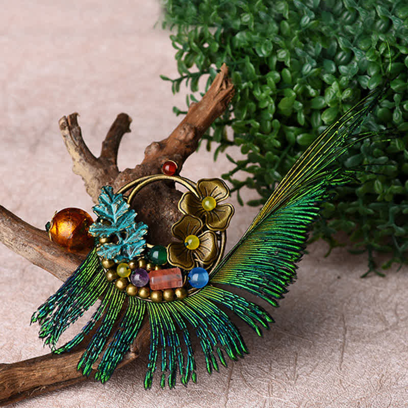 Spilla da donna retrò in bronzo con fiore e piuma di pavone - image 5