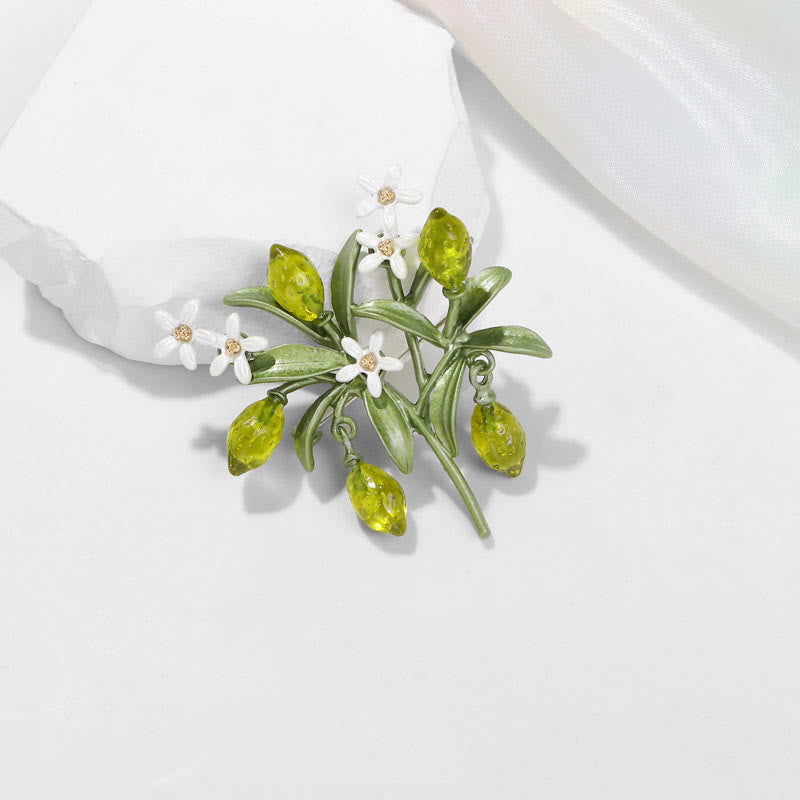 Spilla da donna a forma di goccia di limone con pianta verde - image 4