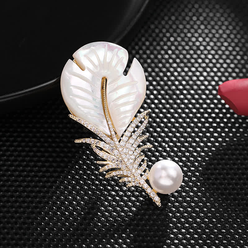 Spilla con piuma e conchiglia di perle da donna - image 3