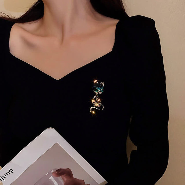 Spilla da donna con occhi di volpe color verde acqua - image 1